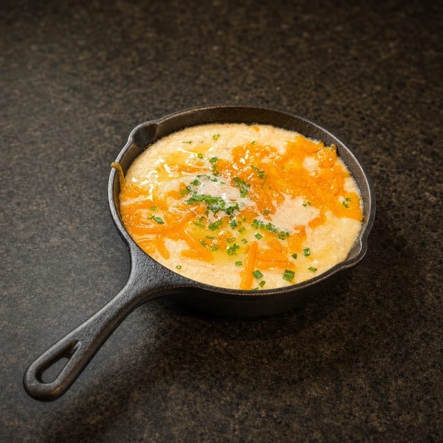 CHEESY GRITS.